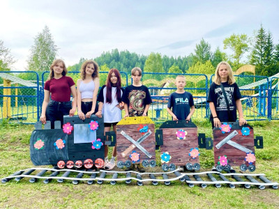 Рельсы, шпалы, лагерь: День ЖД профессий в фотографиях.